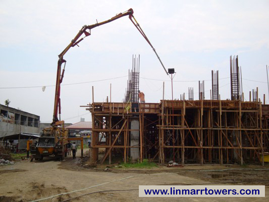 Image of concrete pouring on second flooring at Linmarr Towers Condominium Complex