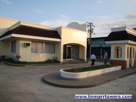 Image of a completed Administration Building and Guardhouse of Linmarr Towers Condominium Complex